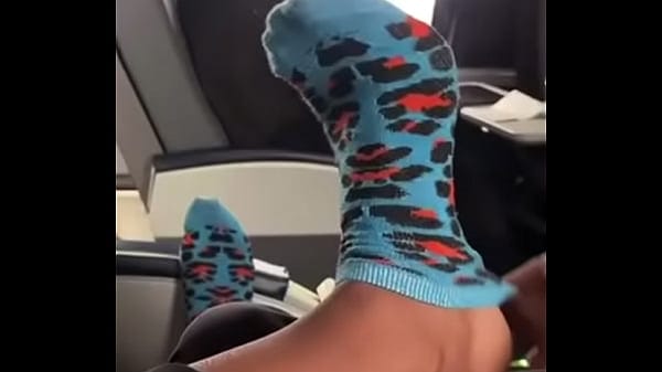 Pretty feet tease BBC on plane